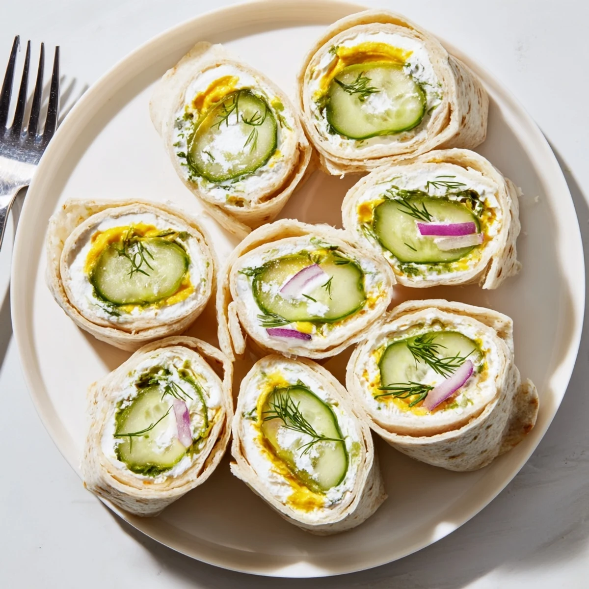 Delicious Pickle-in-a-Blanket wraps with creamy cheese and crispy dill pickles.  