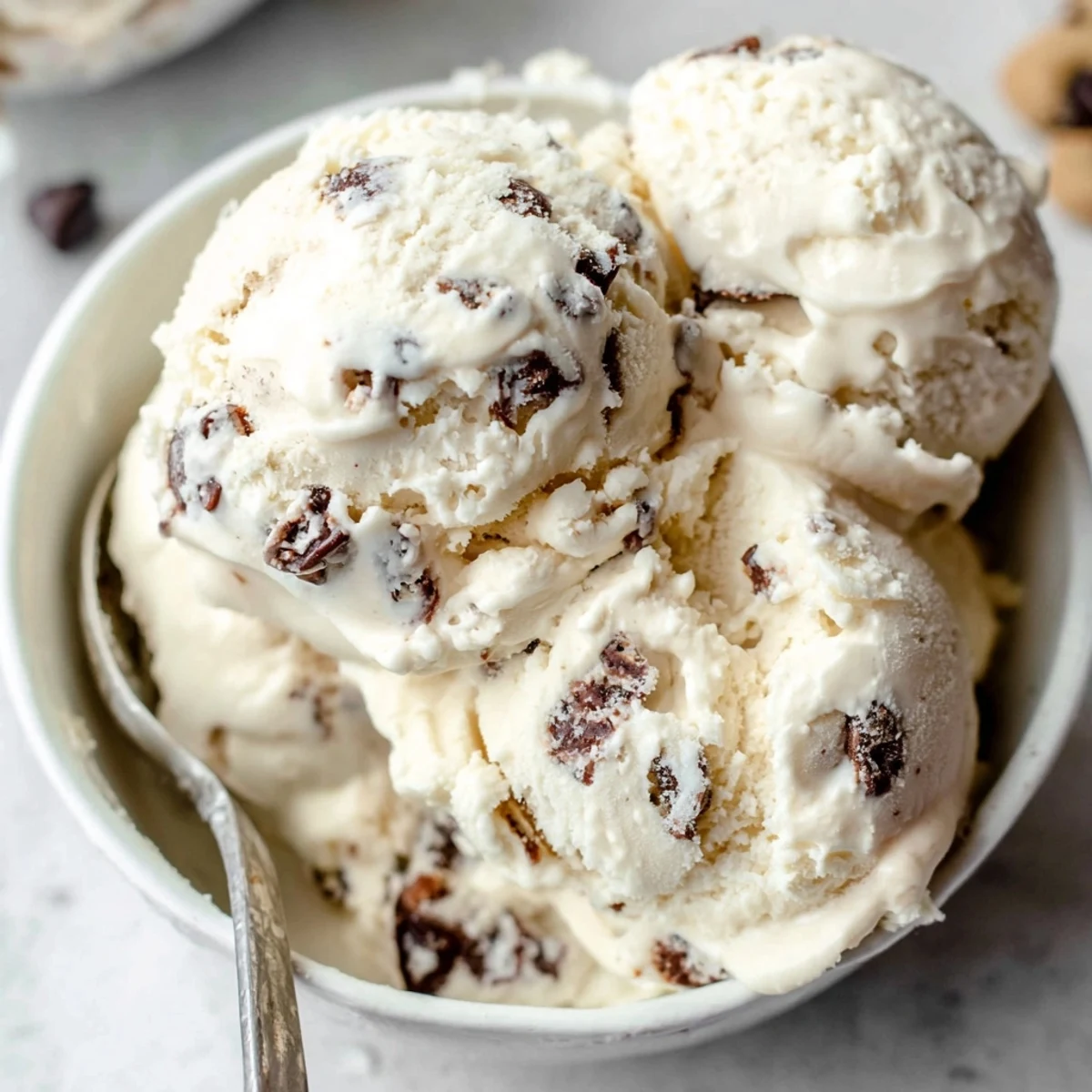 Creamy cottage cheese ice cream swirled with rich chocolate chip cookie dough bites.  