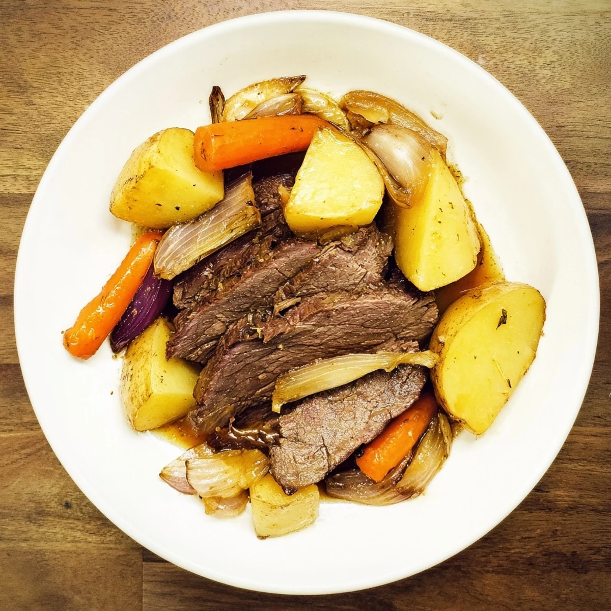 Tender Sunday Pot Roast with vividly roasted vegetables, perfect for a hearty and satisfying dinner.
