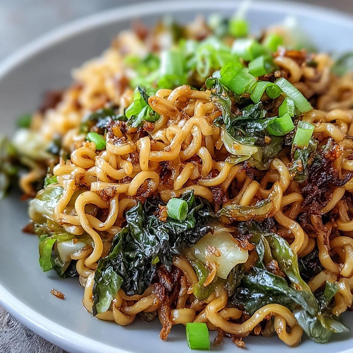 Fried Cabbage Ramen with crunchy browned cabbage and chewy noodles tossed in savory sauce.