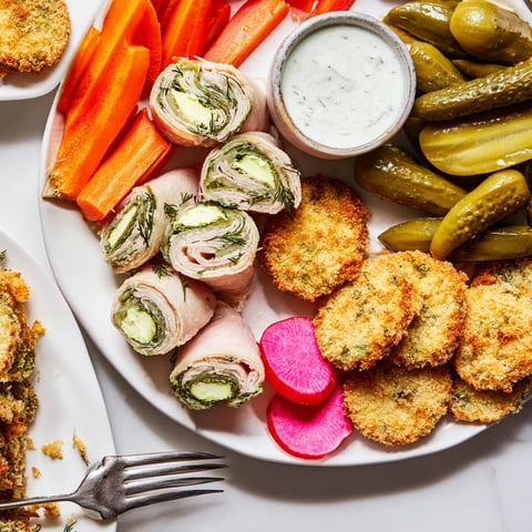 Crispy fried pickles served with zesty dipping sauce for a flavorful Pickle Lovers Meal.