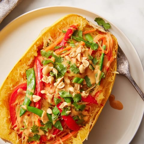 Golden roasted Thai Peanut Spaghetti Squash Boats, light, healthy, and gluten-free.