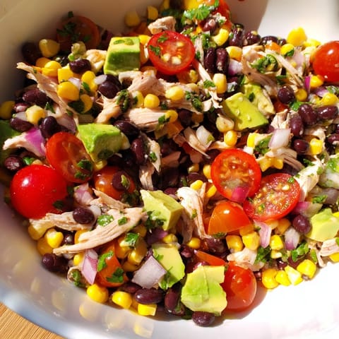 A close-up of a flavorful Dense Southwestern Bean Salad, perfect for a picnic or a quick lunch.