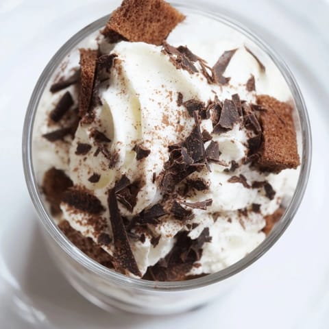 Elegant Deconstructed Tiramisu Shots layered with creamy mascarpone, dusted cocoa, perfect for dessert or a party.