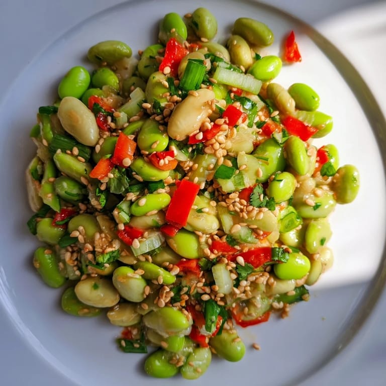 Chilled Edamame Salad, featuring bright green edamame and colorful vegetables, a tasty side.